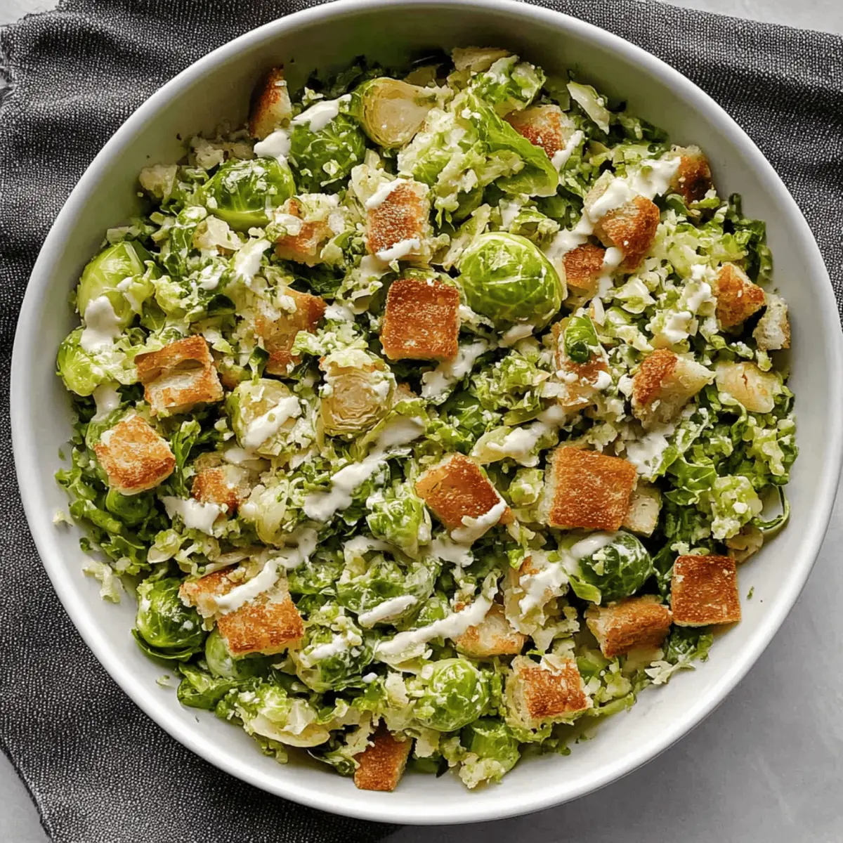 Delicious Brussels Sprout Caesar Salad Recipe with Homemade Croutons