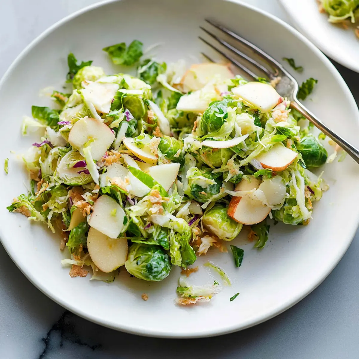 Delicious Apple & Brussels Sprouts Slaw with Pecorino and Almonds