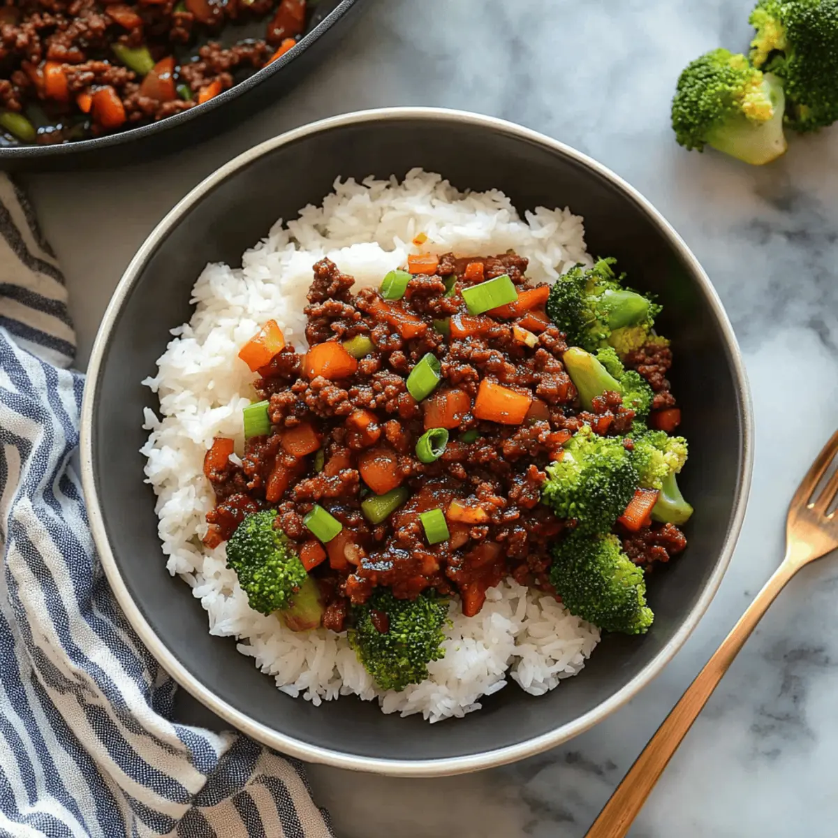 Spicy Ground Beef Stir-Fry Bowl with Garlic Veggies & Steamy Rice